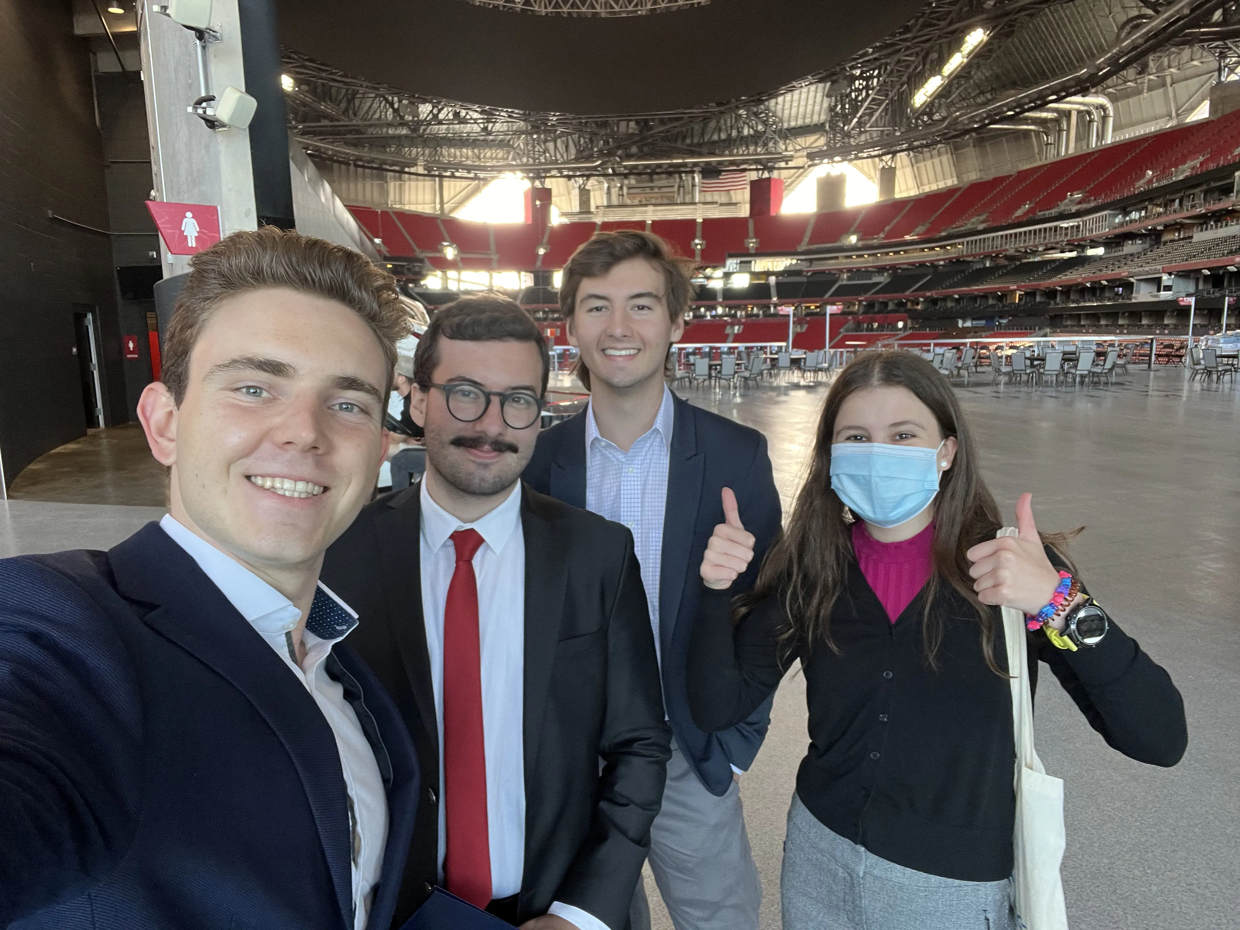 At Mercedes Benz stadium with other head TAs for a networking event for College of Computing leaders